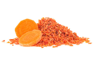 Chopped dried carrot and fresh carrot slices isolated on a white background