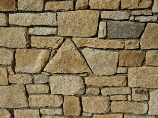 closeup of a stone wall background texture