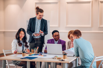 Multiracial business group of people having a meeting in an office