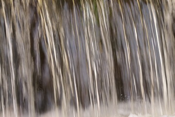 Waterfall. Blurred Background With A Stream Of Water