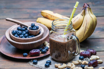 Blueberry mix ripe banana smoothie purple fruit juice milkshake blend beverage healthy high protein...