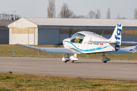 Robin DR400 airplane taxiing in Altenrhein in Switzerland 12.2.2022