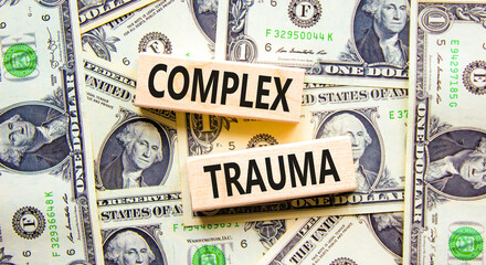 Complex trauma symbol. Concept words Complex trauma on wooden block. Beautiful background from...