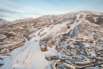 Aerial view of ski resort and mountain town of Steamboat Springs, Colorado with winter landscape...