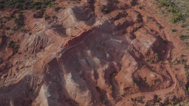 Birds eye view of desert Texas landscape during sunset in the Caprock Canyons - 4K Drone cinematic shot