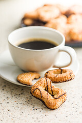 Assorted various cookies. Sweet biscuits and coffee cup.