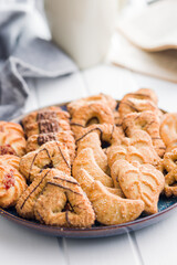 Assorted various cookies. Sweet biscuits on plate.