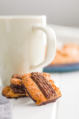 Assorted various cookies. Sweet biscuits and coffee cup.