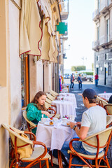 Family at outdoor cafe