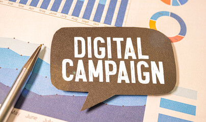 Card with text digital campaign in the wooden background. Business online concept.