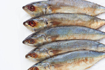 Salted fish on white background.