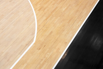 Wooden floor volleyball, basketball, badminton, futsal, handball court with light effect. Wooden floor of sports hall with marking lines line on wooden floor indoor, gym court