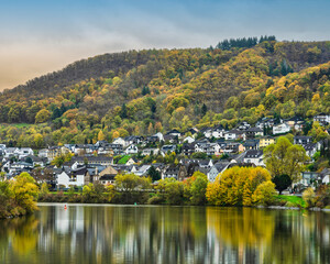 Fototapeta na wymiar Sehl village on Moselle river during autumn in Cochem-Zell district in Rhineland-Palatinate, Germany