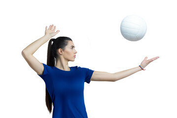 Volleyball girl hold and kick ball in blue costume on white background. Player doing sport workout...