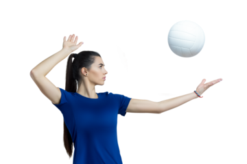 Volleyball girl hold and kick ball in blue costume on white background. Player doing sport workout at home. Sport and recreation concept