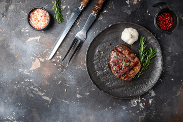 Grilled beef tenderloin steak. Restaurant menu, dieting, cookbook recipe top view