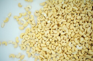 Tasty cashew nuts as background, top view Big pile of cashew nuts isolated on white background. Package design element with clipping path High quality photo