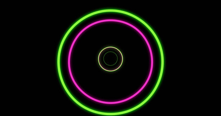 Image of green and pink neon circles on black background