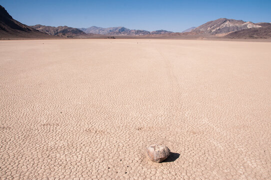 Rock at end of track at the race track in the desert of Death Valley in California