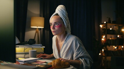 Serious girl reading pc home closeup. Confused woman watching desktop computer