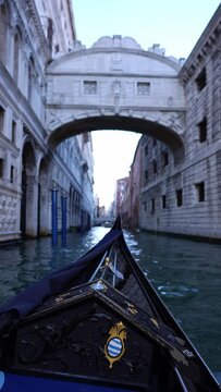 The sound of the gondolier's singing echoes through the narrow canals of Venice