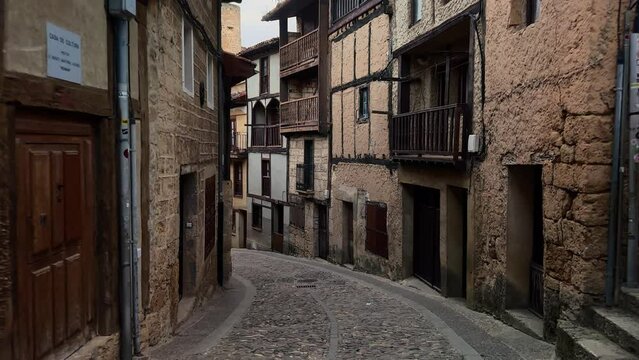 POV walking at scenic streets of the medieval town of Frias, Burgos, Spain. High quality 4k footage