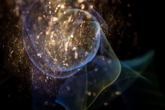 Abstract light shapes on dark background. Long exposure photography without the use of photoshop.