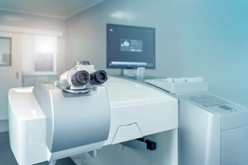 Ophthalmic laser system in eye surgery clinic. Excimer laser in operating room