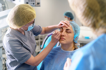 Blepharoplasty plastic surgery. Rejuvenation and modification of the area around the eyes. Plastic...