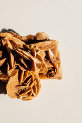 Desert rose mineral cluster from Tunisia, North Africa on white