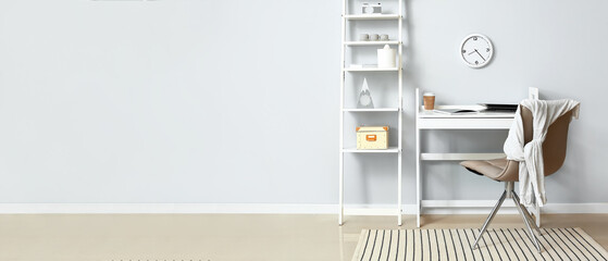 Interior of stylish room with modern workplace and shelving unit. Banner for design - obrazy, fototapety, plakaty