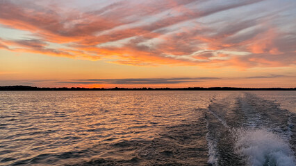 sunset boat ride on the lake