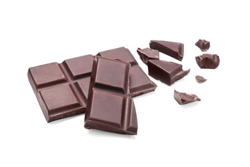Pieces of delicious dark chocolate bar on white background