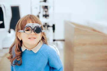 Little Girl Wearing Trial Glasses in Eye Examination Consult Appointment. Child during pediatric ophthalmological consultation in eye clinic
