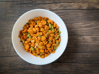Dog food ready to eat on the wood background