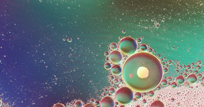 Animation of bubbles moving on blue background with copy space