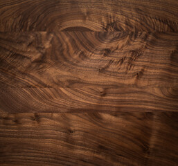 Wood texture background. Dark dark walnut wood plank texture square tabletop background. Walnut...