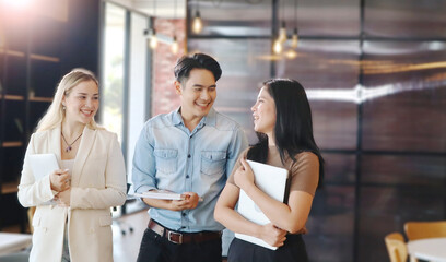 Portrait of smiling happy multi-ethnic business teamwork in the office. Best collaboration concept for work