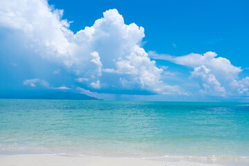 Background Summer beach and blue sea water and beach sunny sky cloudy on the island