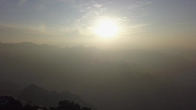 Aerial Rises Above Mountain Peaks Shrouded In Fog, Mt Huashan China