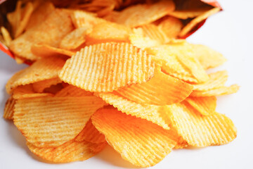Potato chips in open bag, delicious BBQ seasoning spicy for crips, thin slice deep fried snack fast food.