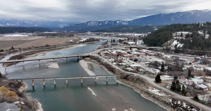 Fly Away From Bonners Ferry Idaho Riverside Landscape City Downtown Aerial Drone Flyover Kootenay River
