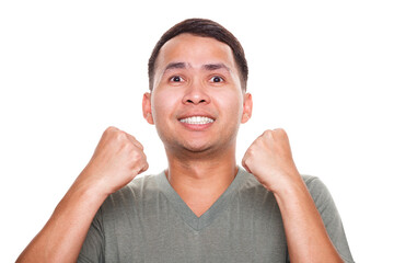Man very happy and excited doing winner gesture with arms raised isolated on white background