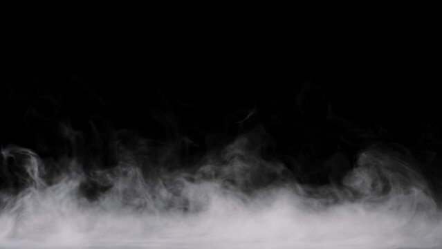 fog spreading on black background