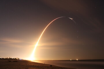 rocket launch over ocean