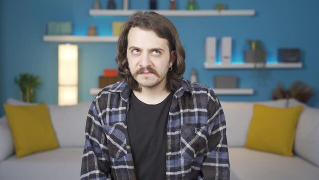 The idea man. He's running a secret business. Thoughtful state.
Thoughtful man seeks and finds ideas about a business he is running incognito.
