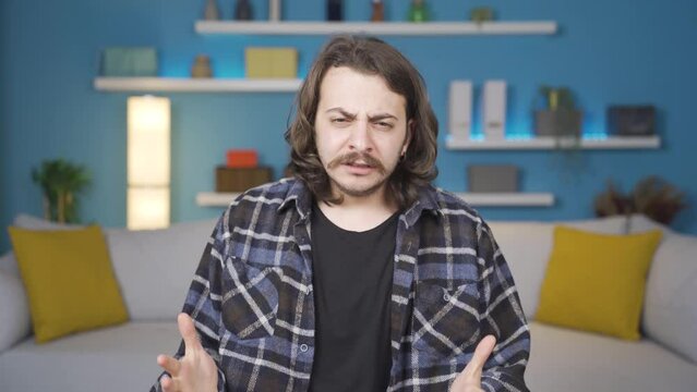 Man with nervous breakdown shouts.
Very angry shouting man. He doesn't calm down, he goes crazy.
