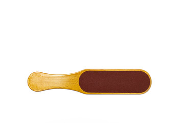 pedicure foot grater with a wooden handle on a white background.