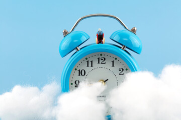 Miniature world old man on the cloud alarm clock