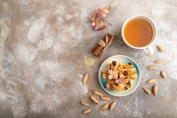Traditional candy nougat with nuts and sesame, top view, copy space.